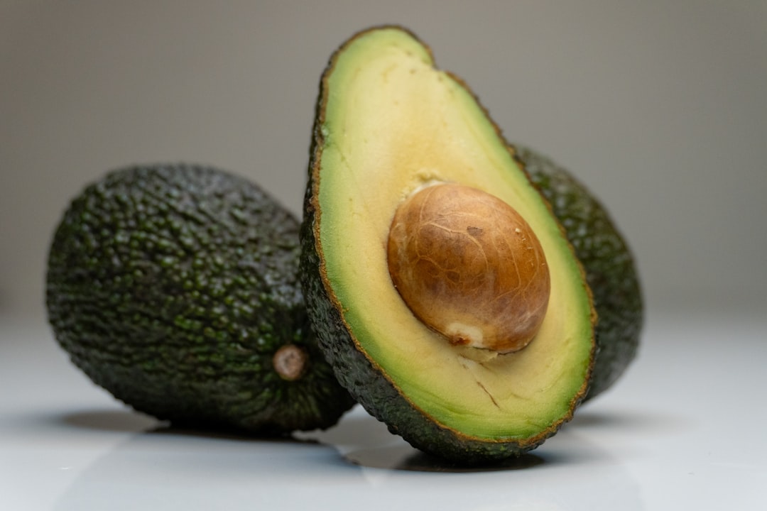 an-avocado-cut-in-half-on-a-table-xppq-ylnnms